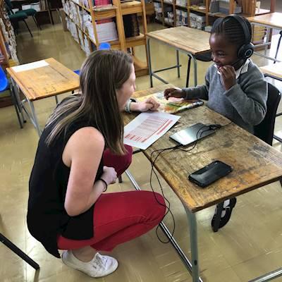 So much excitement as Lauren helps Lebogang to login to her next session