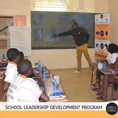 School Leadership Development Program (SLDP) volunteer conducting a session
