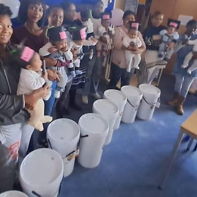 Moms at a childcare class graduation