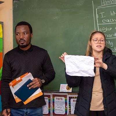 Intern psychologists Nkululeko Hadebe and Jenna Fernandes talking high school learners about the impact of bullying on one's mental health