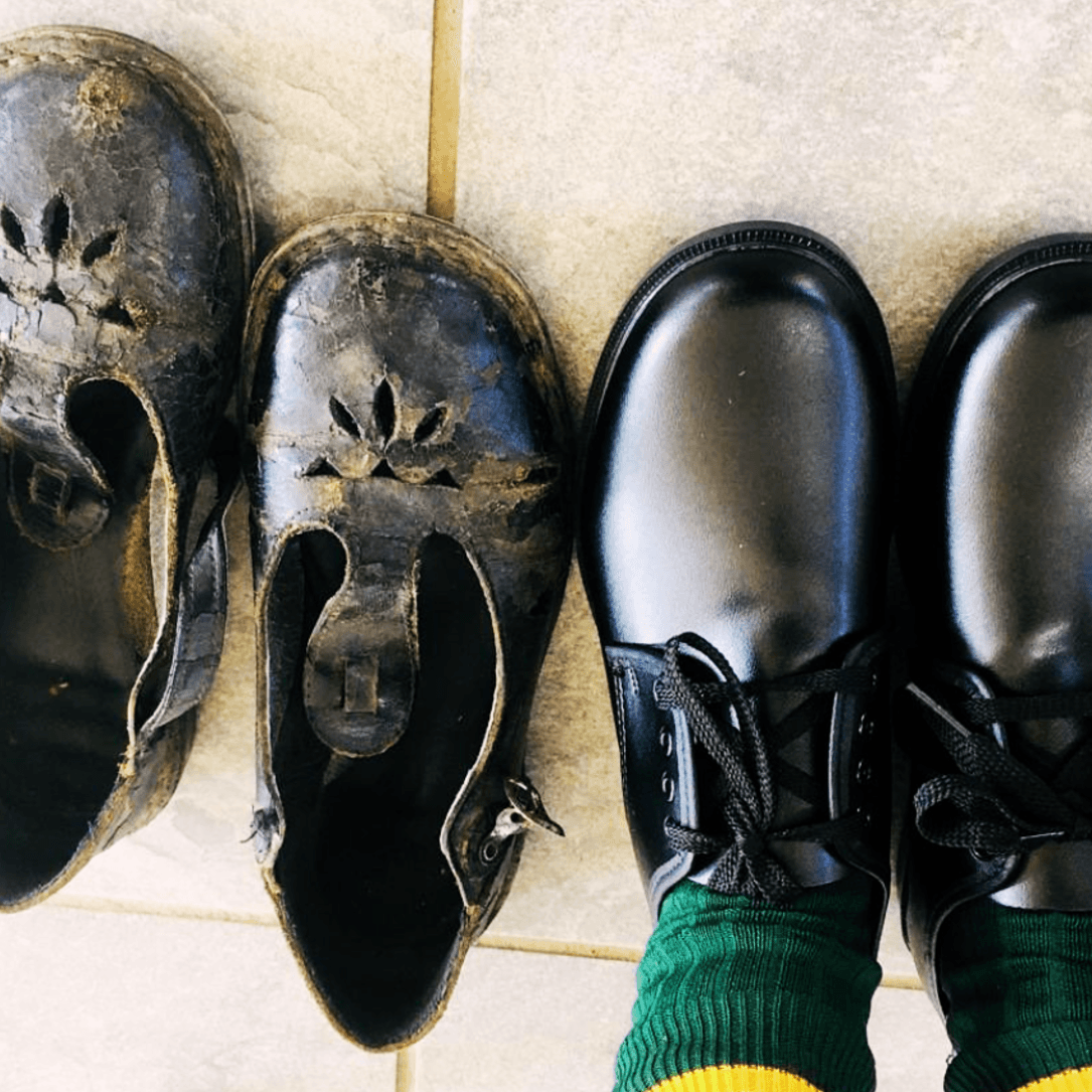 Stepping forward with pride. New school shoes empower children to walk confidently to school, ready to embrace learning with dignity and hope.