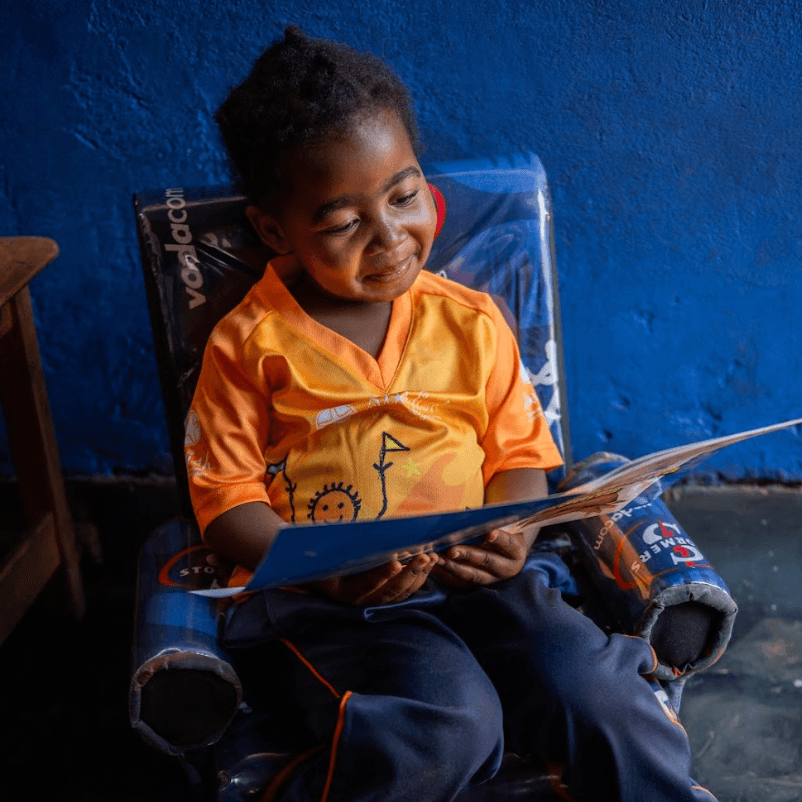 Books unlock worlds of imagination. At Starfish centres, children discover the joy of reading—a gift that lasts a lifetime.