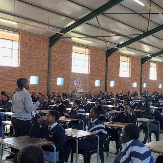 School Visits- Lindiwe Nxazisa engaging with Grade 12 learners about the importance of education as a tool to change ones live and for their families