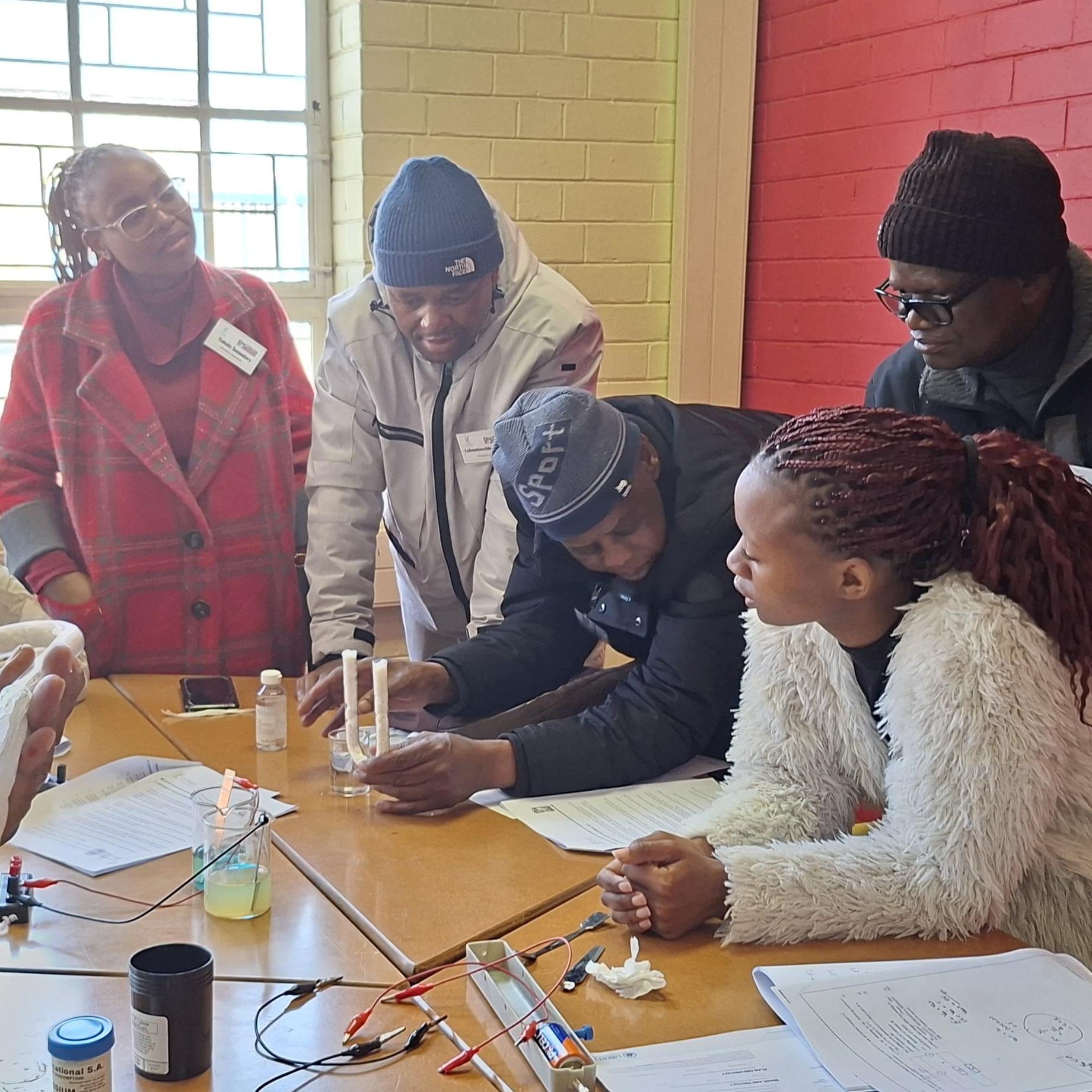 Teachers exploring, discussing and learning together.