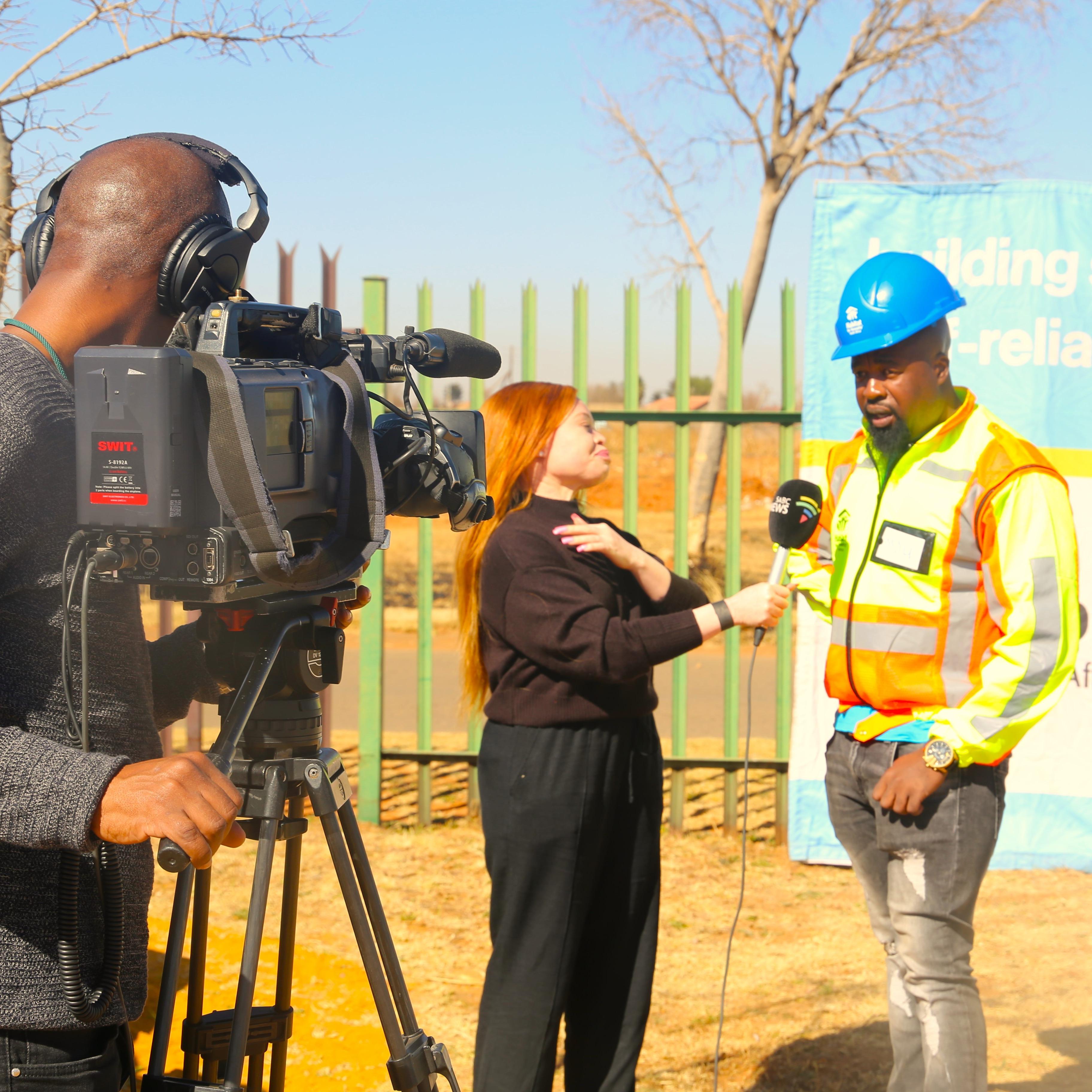 HFHSA Project Management Specialist being interviewed by SABC for Nelson Mandela Build