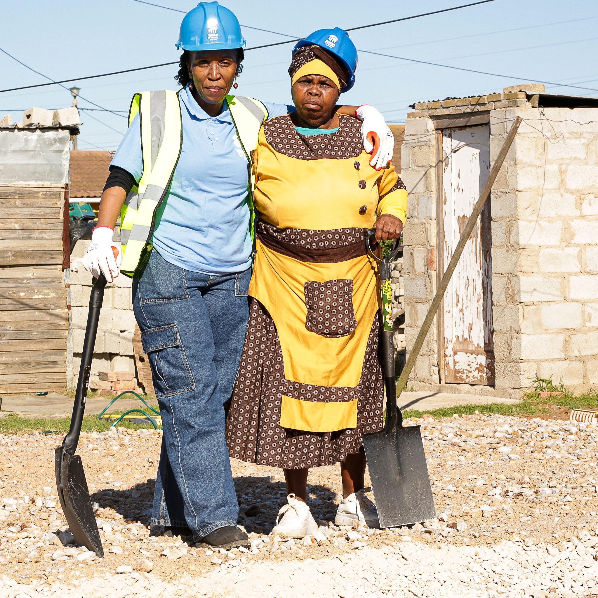 Daphney the National Director with Gladies Njovane(Beneficiary) during Nelson Mandela Build