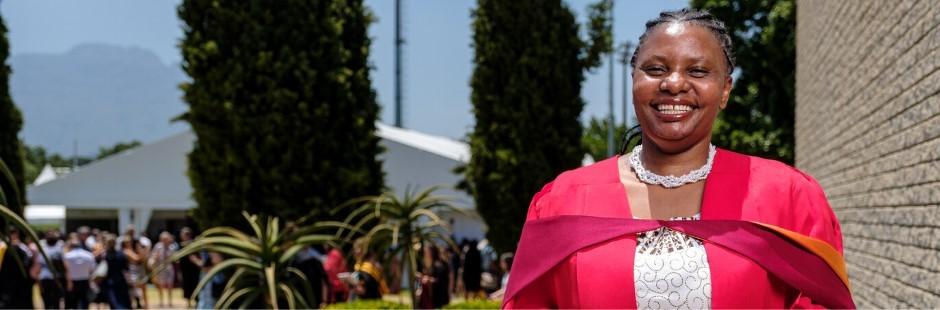 Doctoral graduate conquers the odds