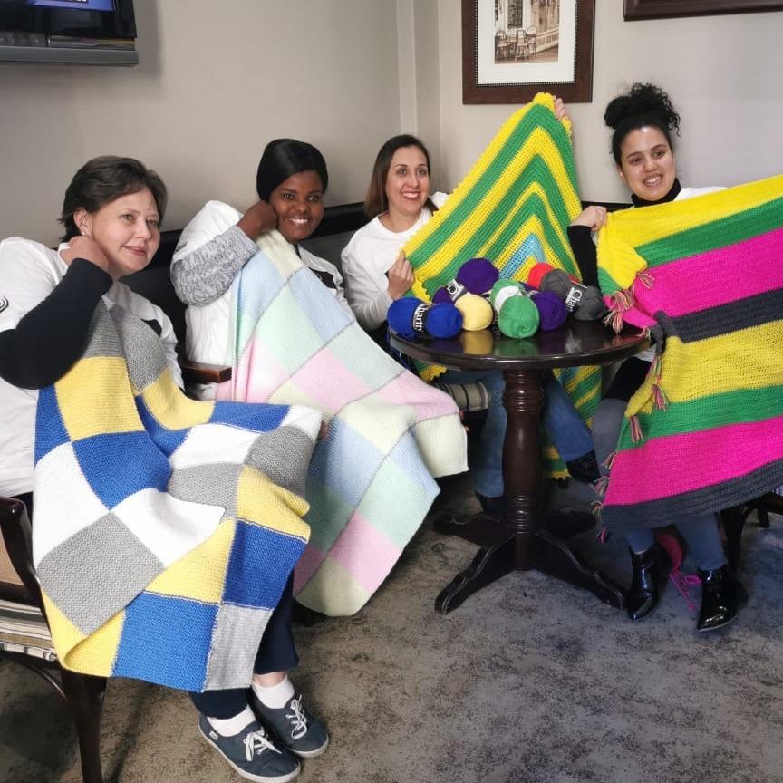 Sewing blankets with Tsogo Sun