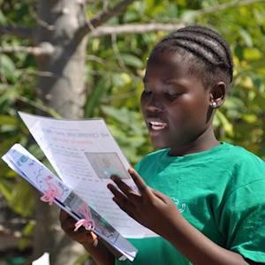 DAKTARI's young student reading her promises to make South Africa a better place