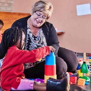 Our CEO or Chief Play Officer, Dr. Monica Stach interacting with the children - her passion for teaching will always outway the boring business stuff she needs to do.