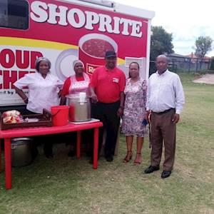 The founder of mphatlalatsane work readiness Programme with members of Shoprite soup kitchen
