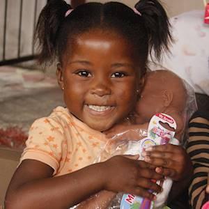 Every young girl LOVES receiving a doll in her Santa Shoebox!