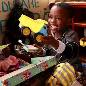 Every young boy LOVES receiving a car or truck in his Santa Shoebox!