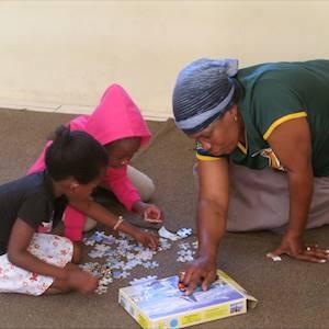 One of our teacher trainees in action as she teaches two of her students (Olievenhoutbosch)