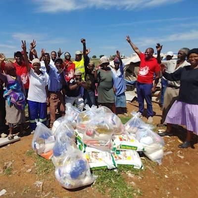Help Meals on Wheels Community Services South Africa by donating dry goods for a food parcel drive for Mandela Day