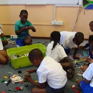 Help Homework Enrichment Lifeskills Progamme HELP with 4 volunteers for primary school children English and Maths