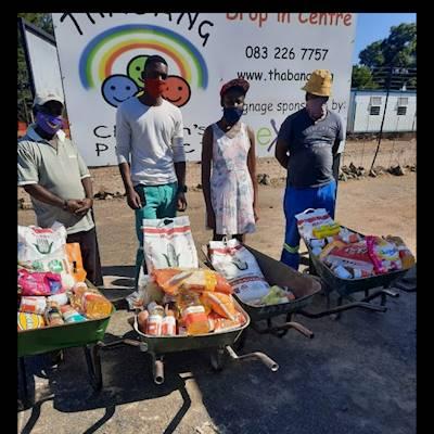 Help Thabang Children's Project by food parcels for needy households in Smasher Block
