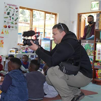 Help Masicorp with 5 volunteers for photography and/or videography stock