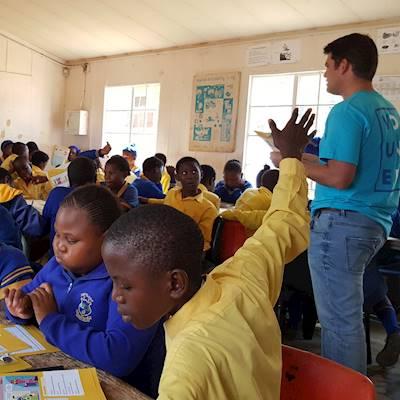 Help Junior Achievement South Africa with 10 volunteers for grade 7 lessons in financial literacy